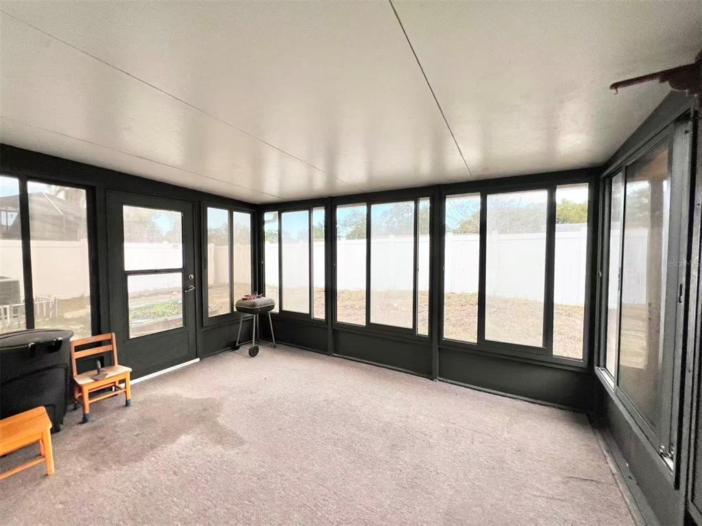 8341 Duval Drive Port Richey, FL 34668 - Photo 23 of 27 a view of an empty room with a window