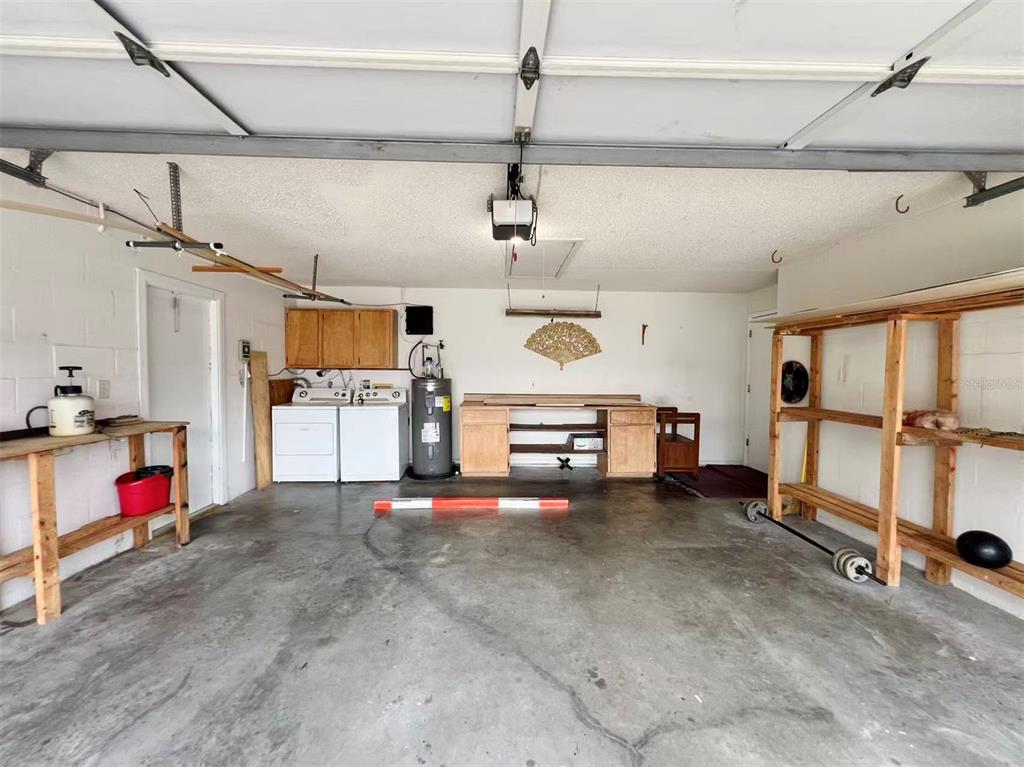 8341 Duval Drive Port Richey, FL 34668 - Photo 26 of 27 a view of storage and utility room with lots of wooden furniture