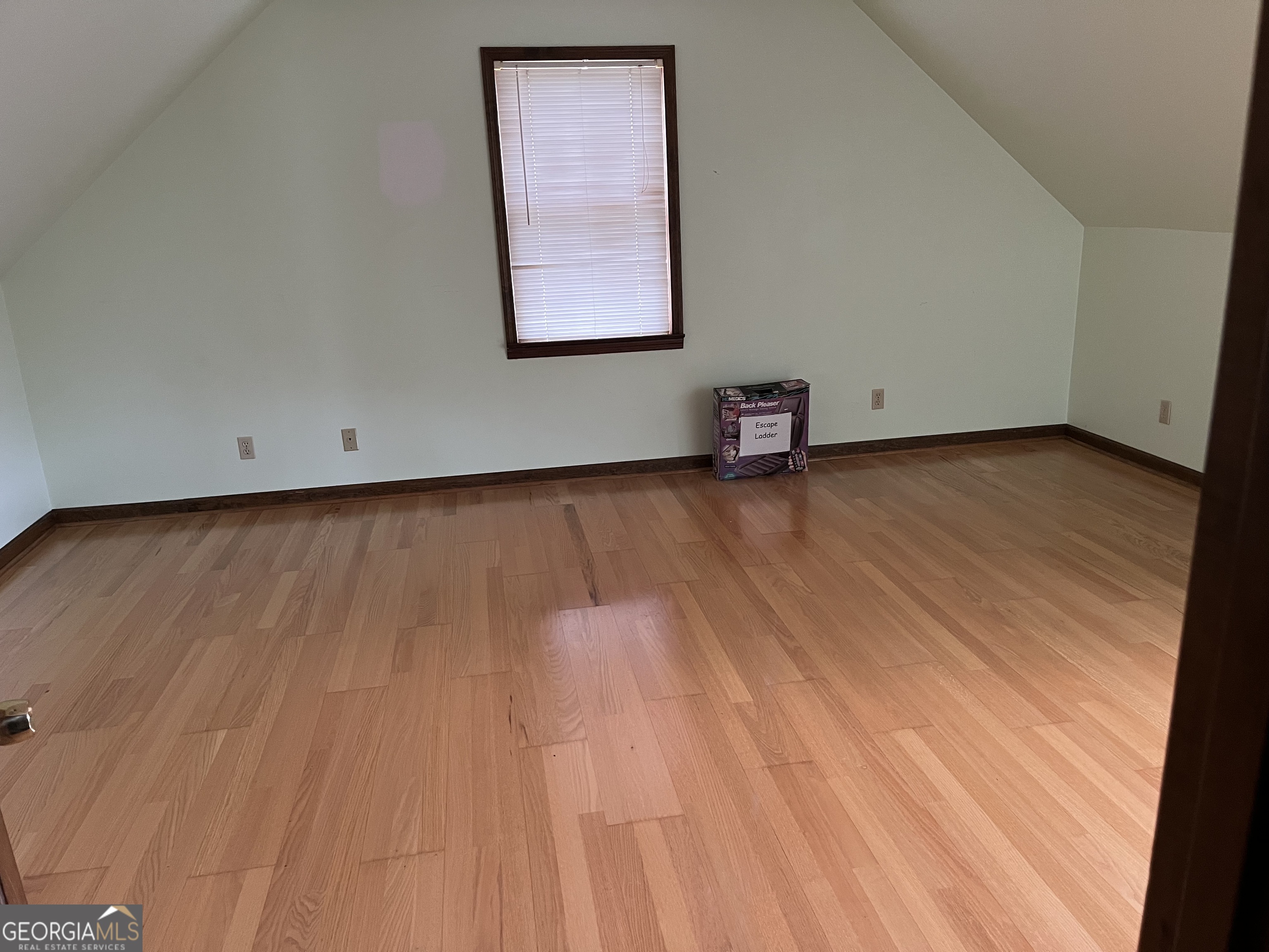 475 Davis Road Southwest Cave Spring, GA 30124 - Photo 12 of 27 a view of a room with wooden floor and a window