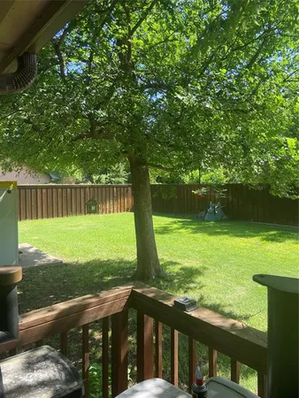 a view of a garden with an outdoor space