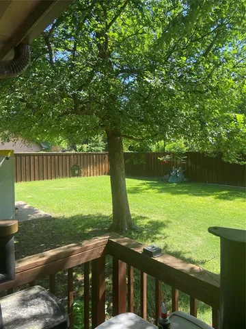 a view of a garden with an outdoor space