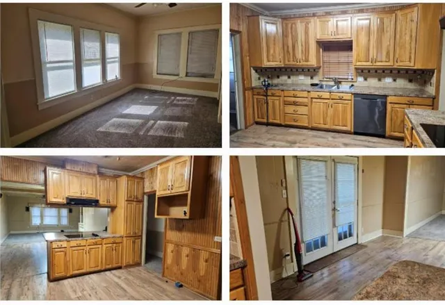 a view of kitchen with cabinets