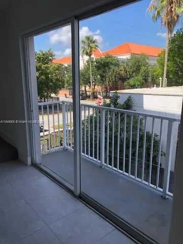 a view of a balcony with an outdoor space