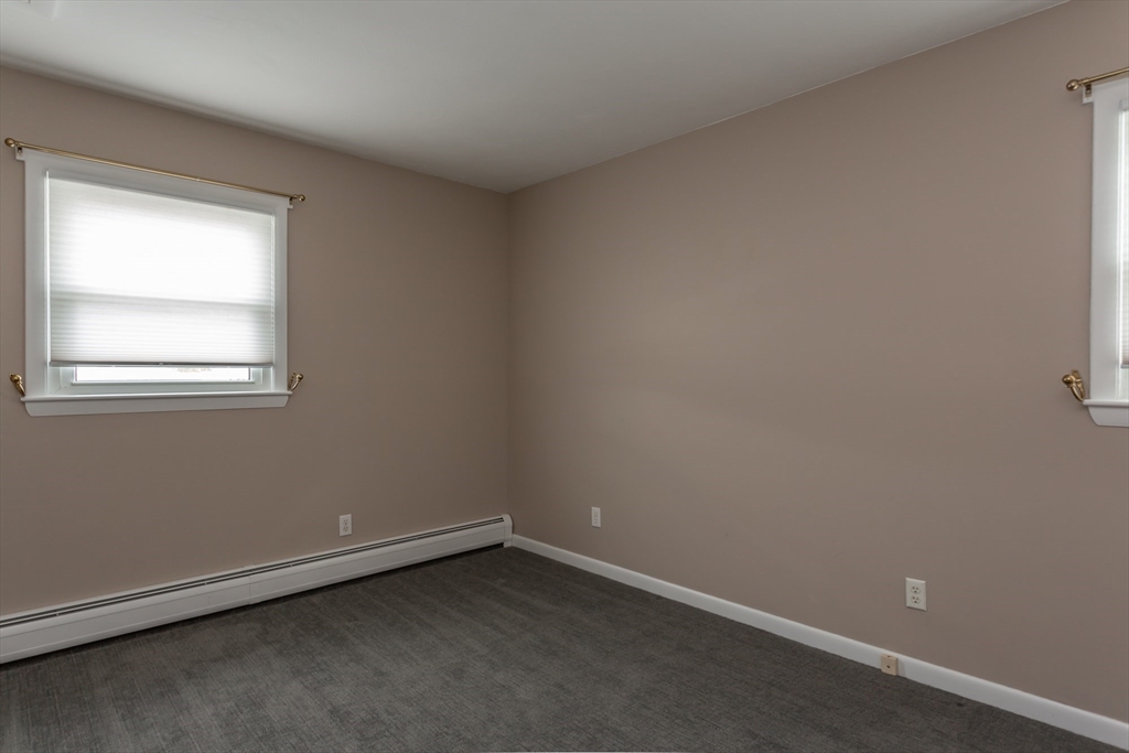 1895 Rodman Street Fall River, MA 02721 - Photo 16 of 26 an empty room with a window