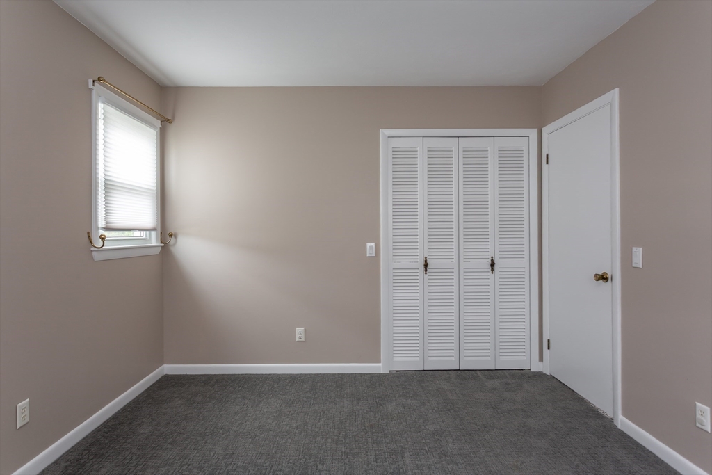 1895 Rodman Street Fall River, MA 02721 - Photo 17 of 26 an empty room with windows