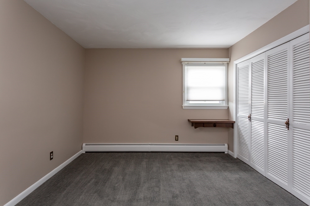 1895 Rodman Street Fall River, MA 02721 - Photo 18 of 26 an empty room with a window