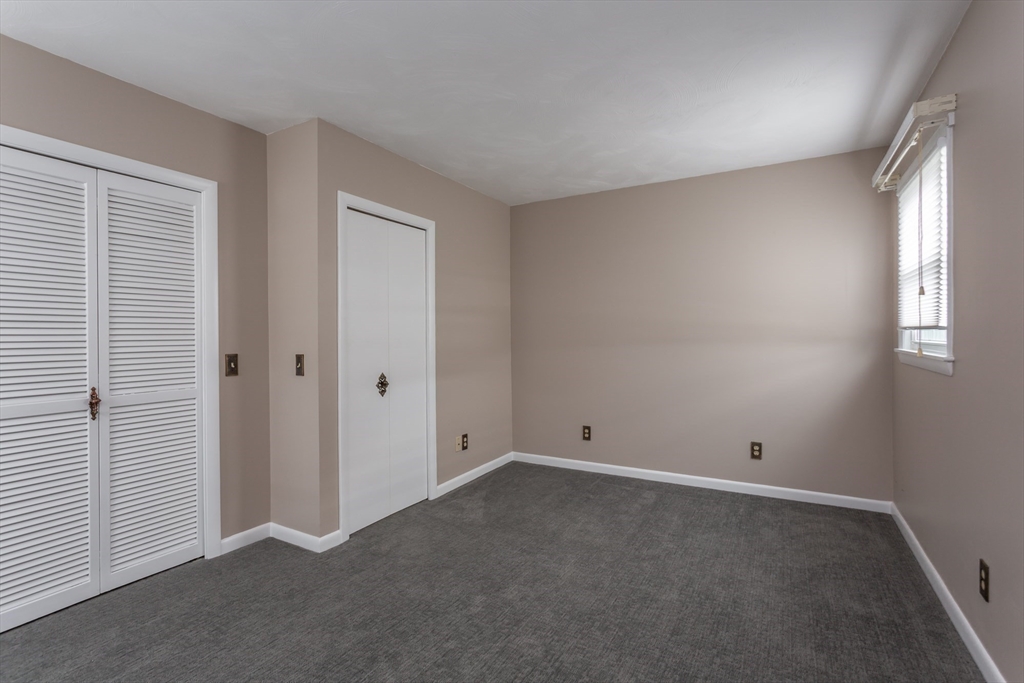 1895 Rodman Street Fall River, MA 02721 - Photo 19 of 26 a view of an empty room with a window