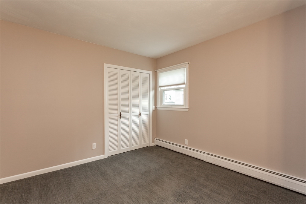 1895 Rodman Street Fall River, MA 02721 - Photo 20 of 26 an empty room with windows