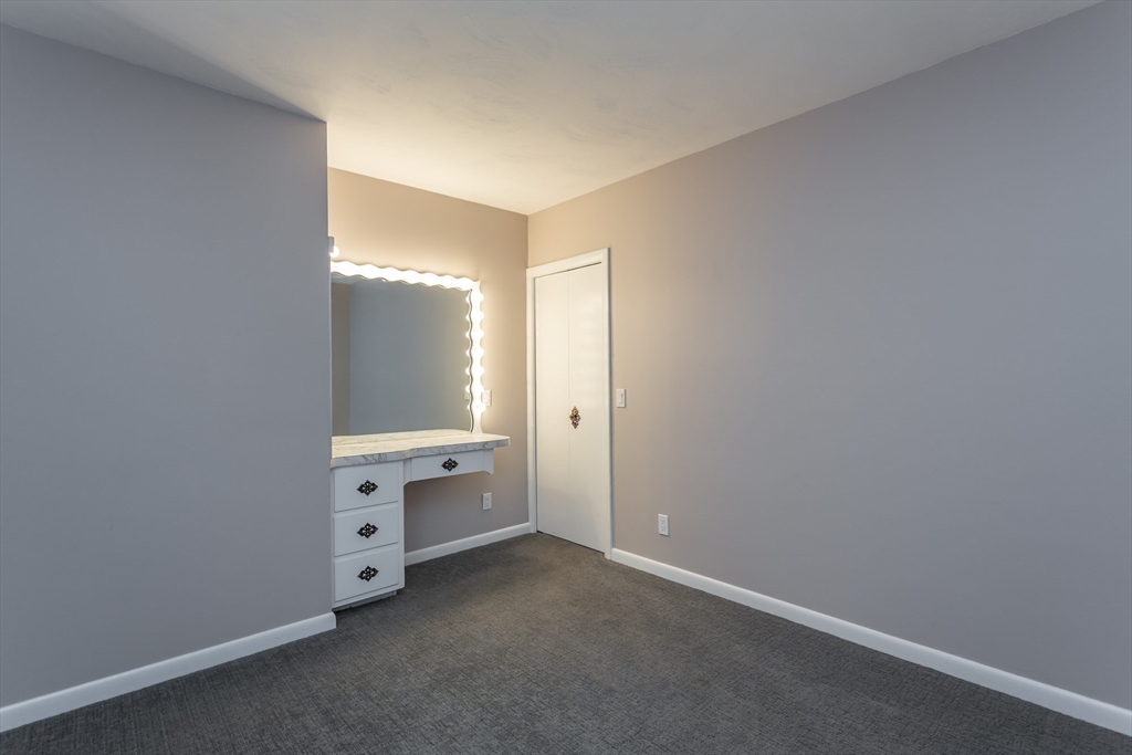 1895 Rodman Street Fall River, MA 02721 - Photo 21 of 26 wooden floor and window in a room