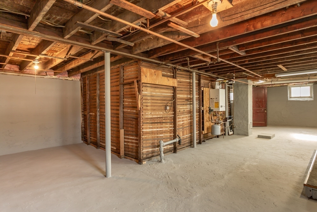 1895 Rodman Street Fall River, MA 02721 - Photo 25 of 26 a view of an empty room with wooden ceiling