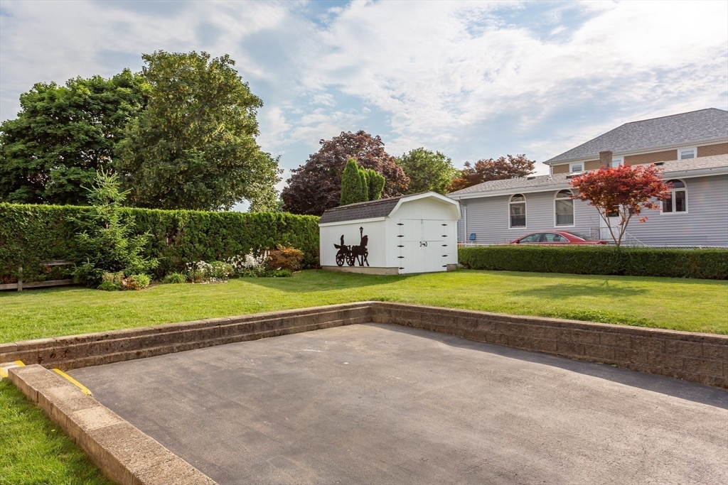 1895 Rodman Street Fall River, MA 02721 - Photo 5 of 26 a view of a house with a yard and sitting area
