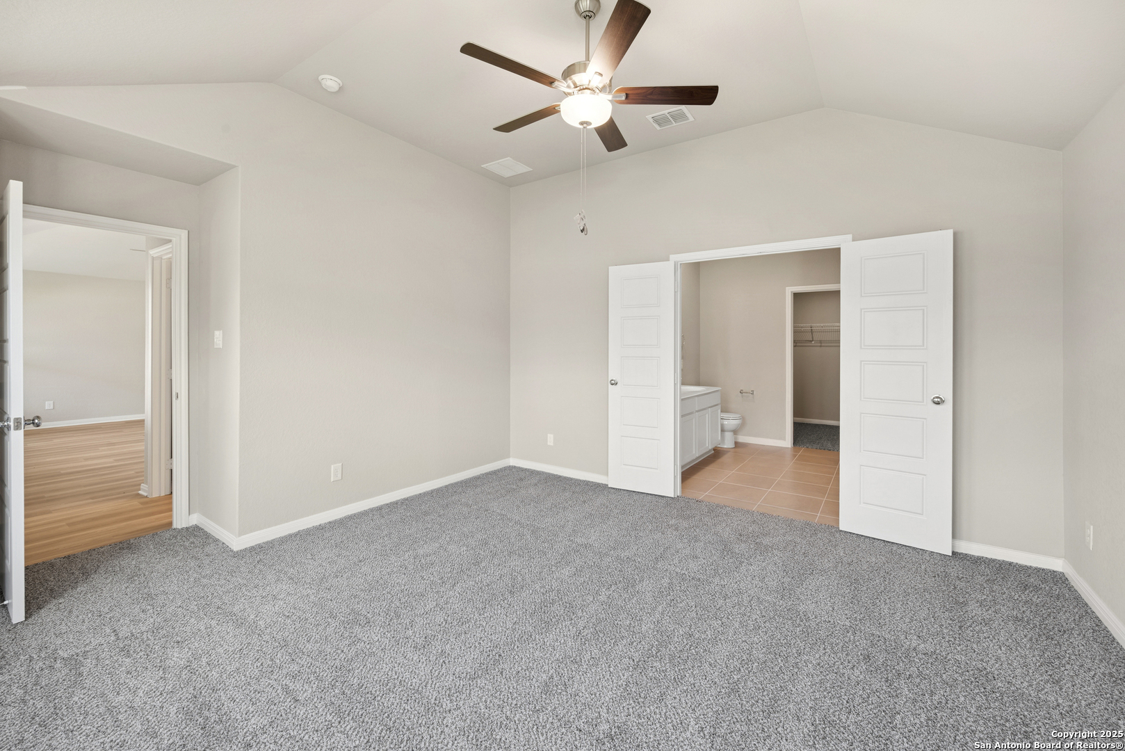 2825 Sun Bayou Seguin, TX 78155 - Photo 16 of 40 a view of an empty room and a ceiling fan