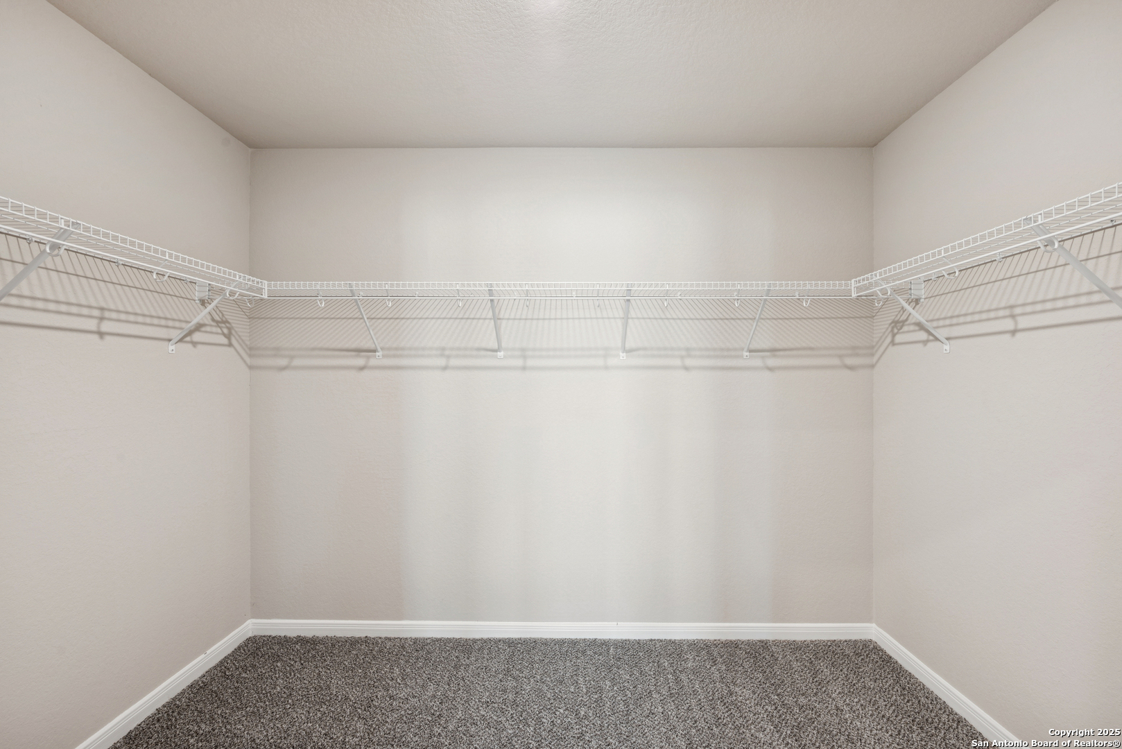 2825 Sun Bayou Seguin, TX 78155 - Photo 22 of 40 a view of a room with racks on the wall