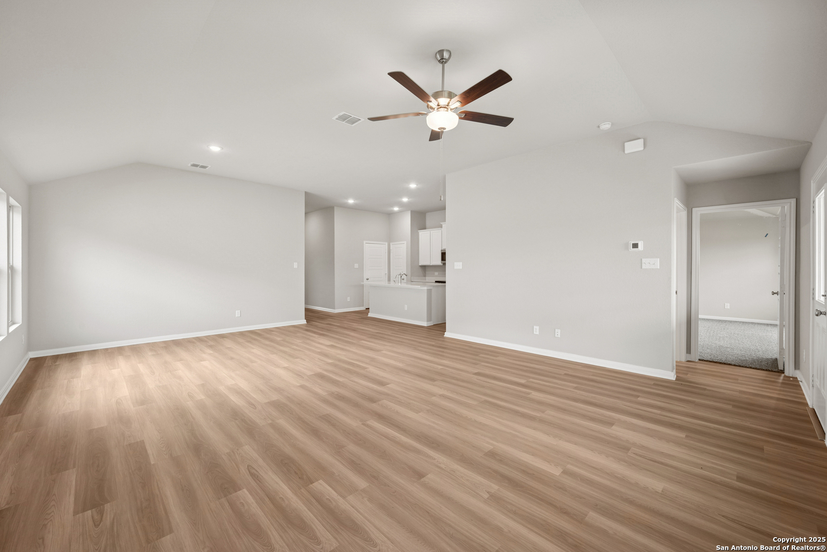 2825 Sun Bayou Seguin, TX 78155 - Photo 10 of 40 a view of an empty room and wooden floor