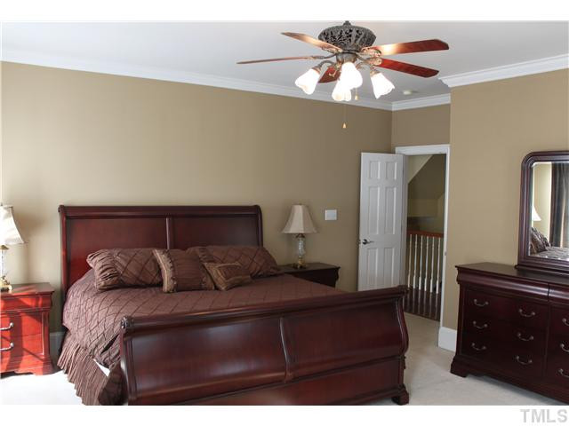 2108 Tulare Court Raleigh, NC 27612 - Photo 13 of 25 Large master suite with light and fan fit carpet double door entrance. Master Suite