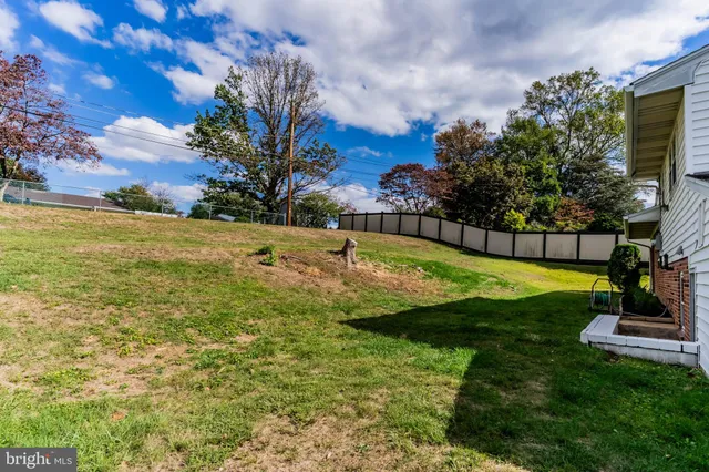a view of a playground with basketball court
