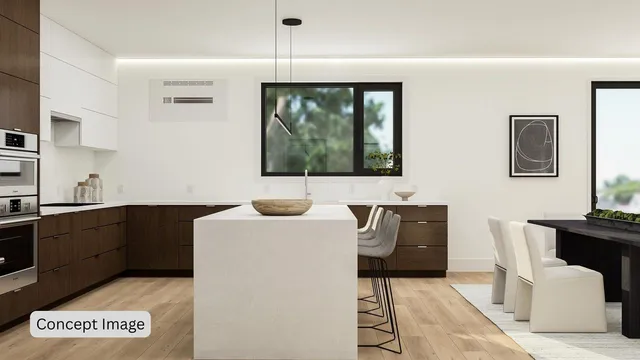 a hallway with a computer on a desk and chair