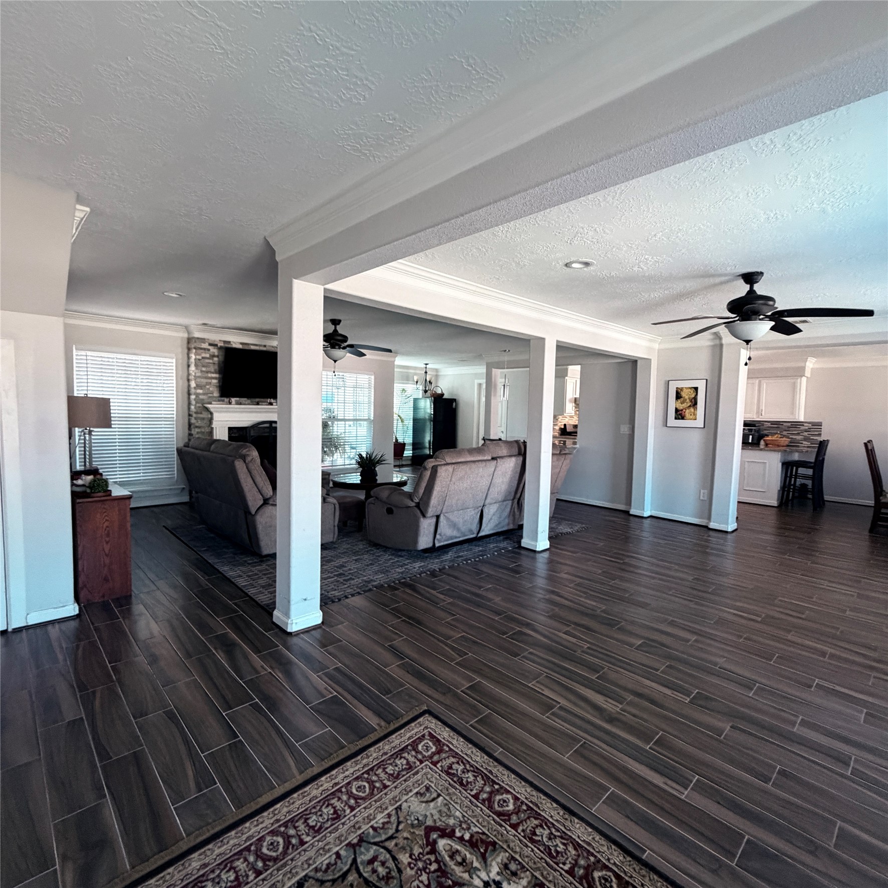 544 Brandon Road Conroe, TX 77302 - Photo 13 of 16 a living room with furniture and a wooden floor