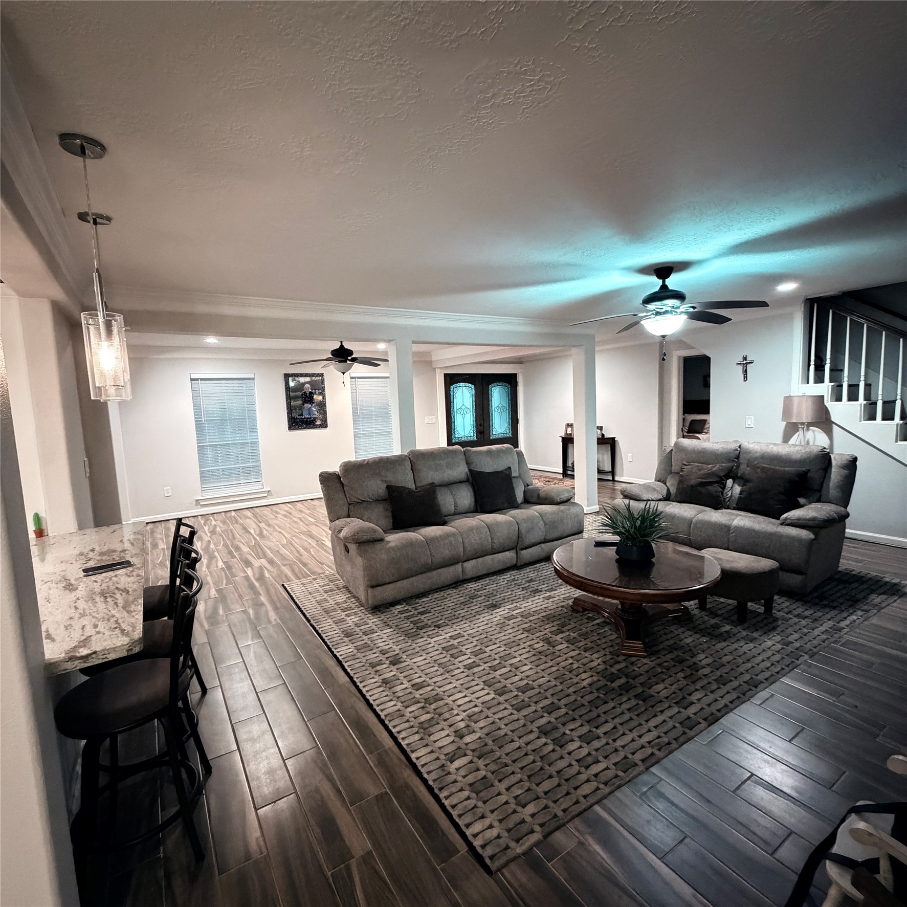 544 Brandon Road Conroe, TX 77302 - Photo 14 of 16 a living room with furniture and wooden floor