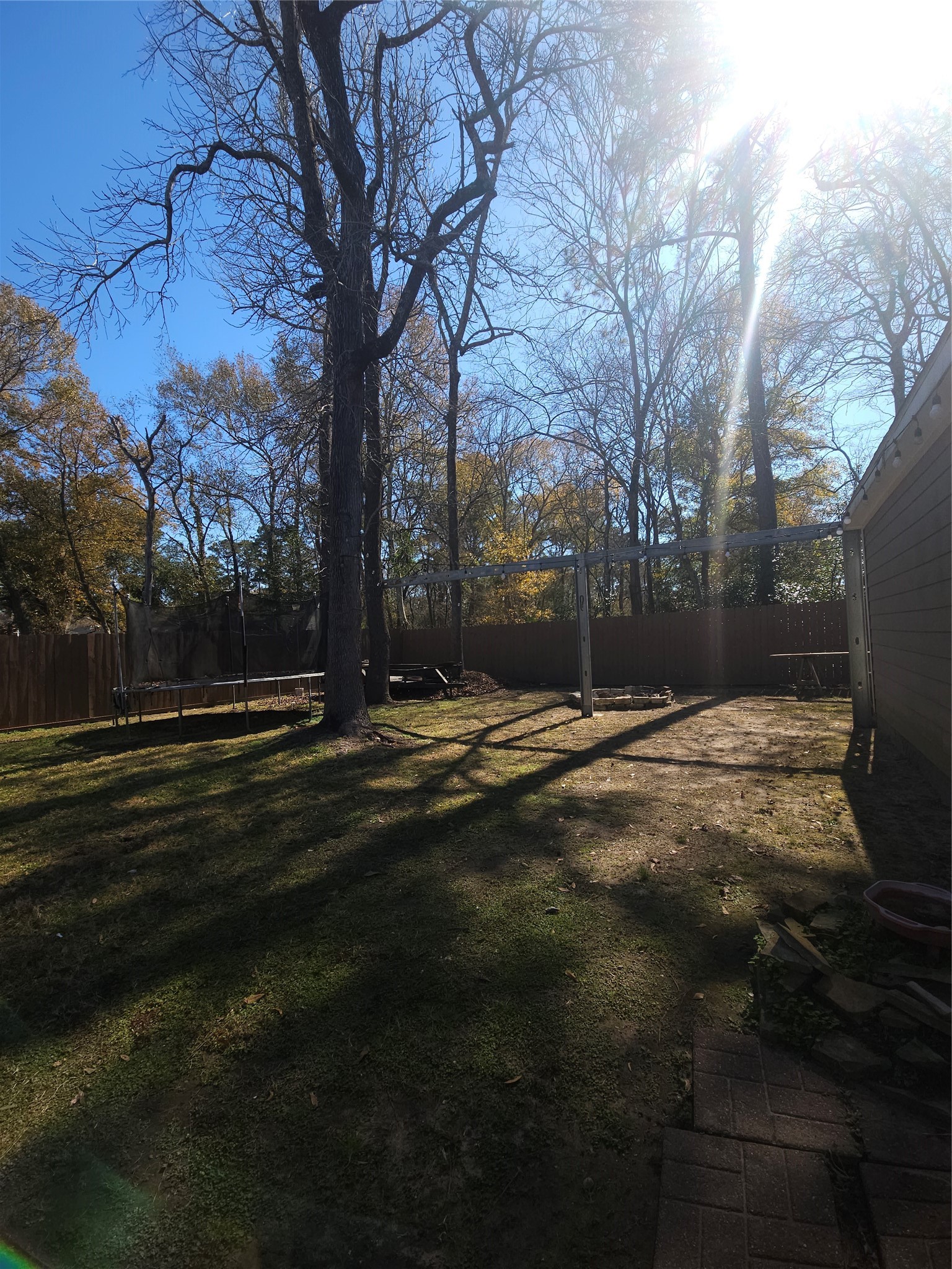 544 Brandon Road Conroe, TX 77302 - Photo 4 of 16 a backyard of a house with lots of green space