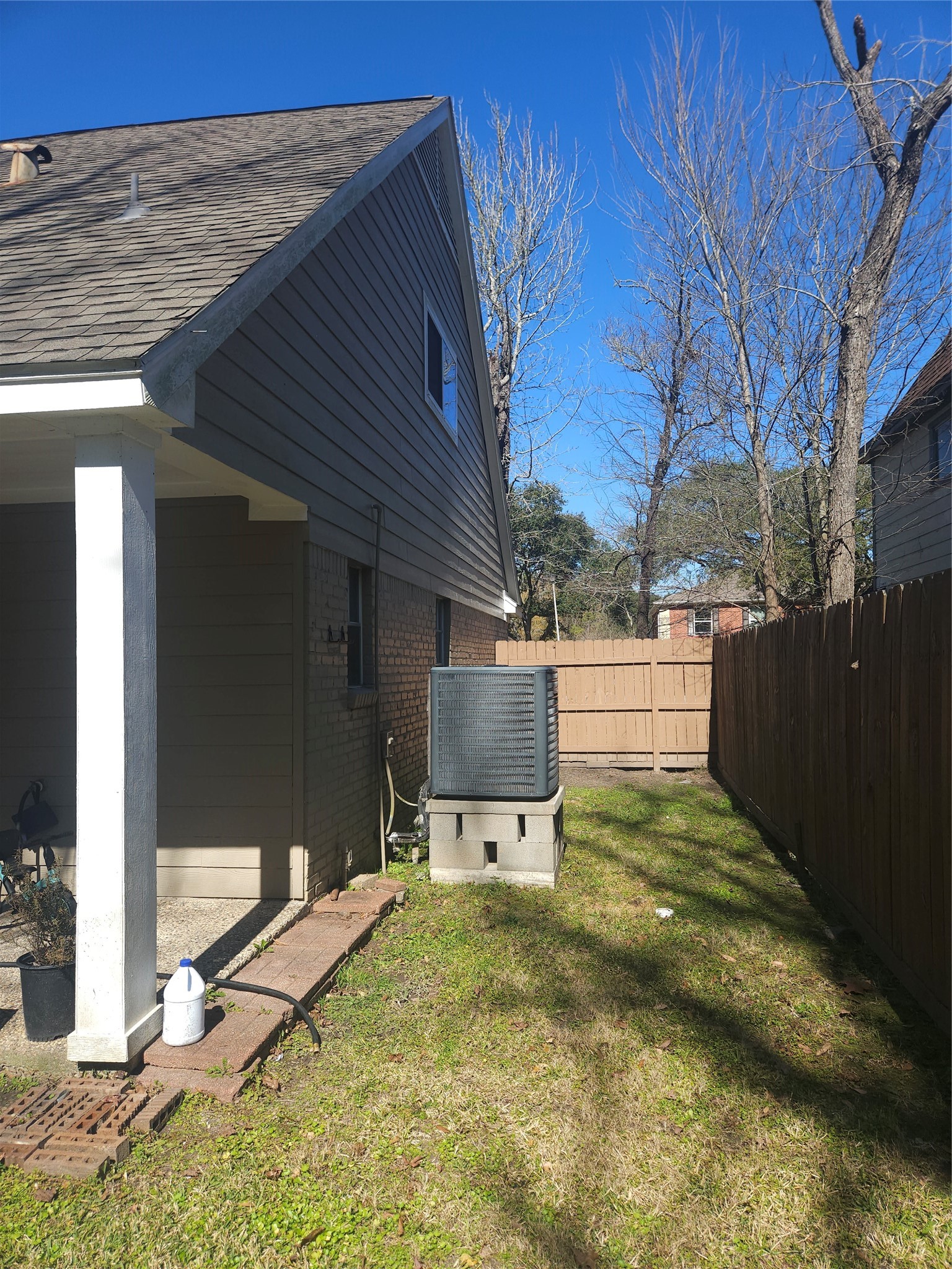 544 Brandon Road Conroe, TX 77302 - Photo 10 of 16 a backyard of a house with yard and outdoor seating