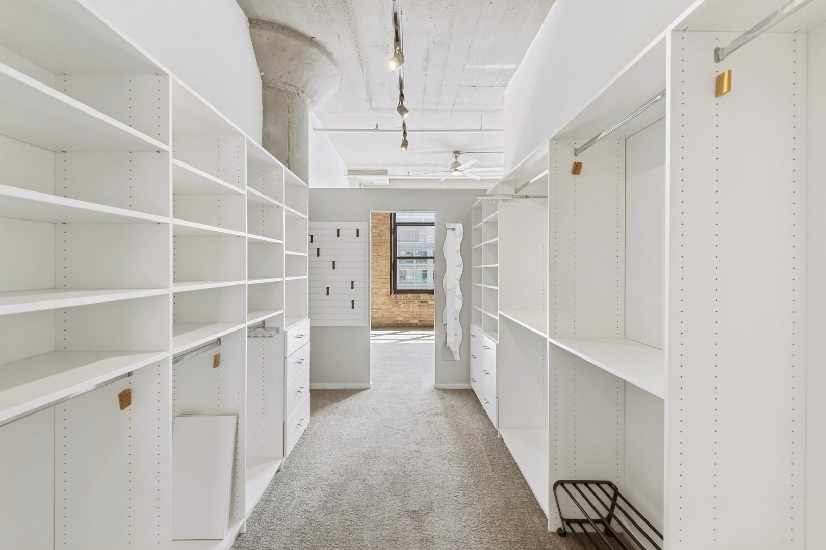360 West Illinois Street, Unit 5F Chicago, IL 60654 - Photo 23 of 36 a view of a walk in closet