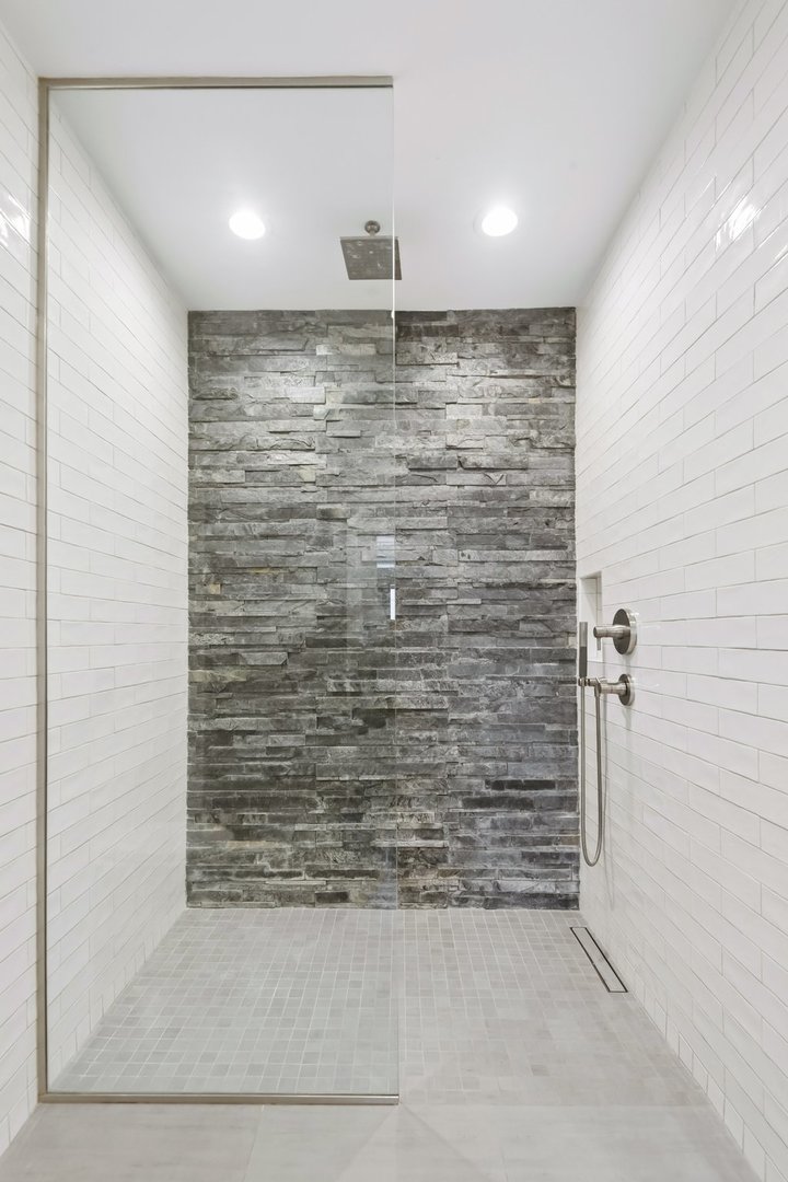360 West Illinois Street, Unit 5F Chicago, IL 60654 - Photo 25 of 36 a bathroom with a shower
