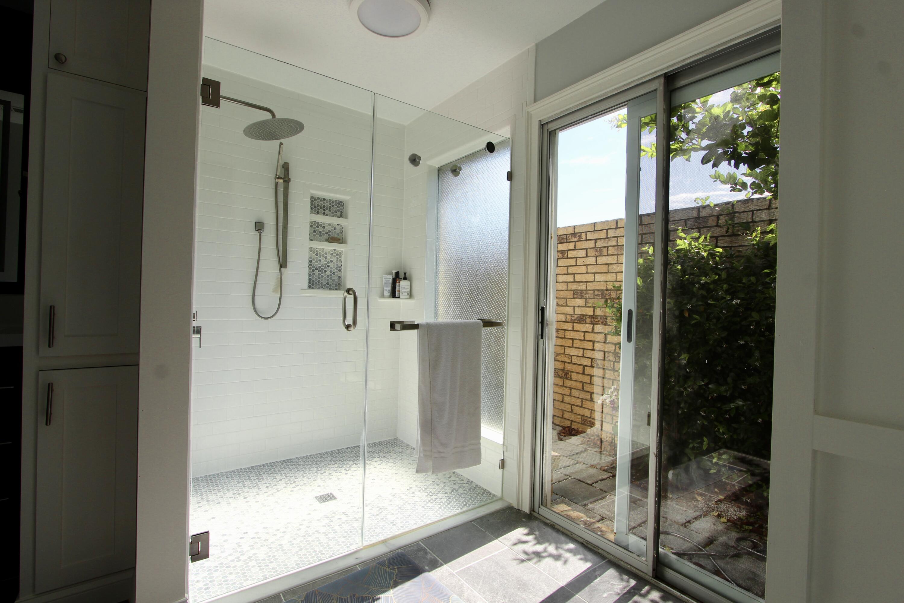 35 Birch Avenue Shalimar, FL 32579 - Photo 25 of 35 a bathroom with a glass shower door