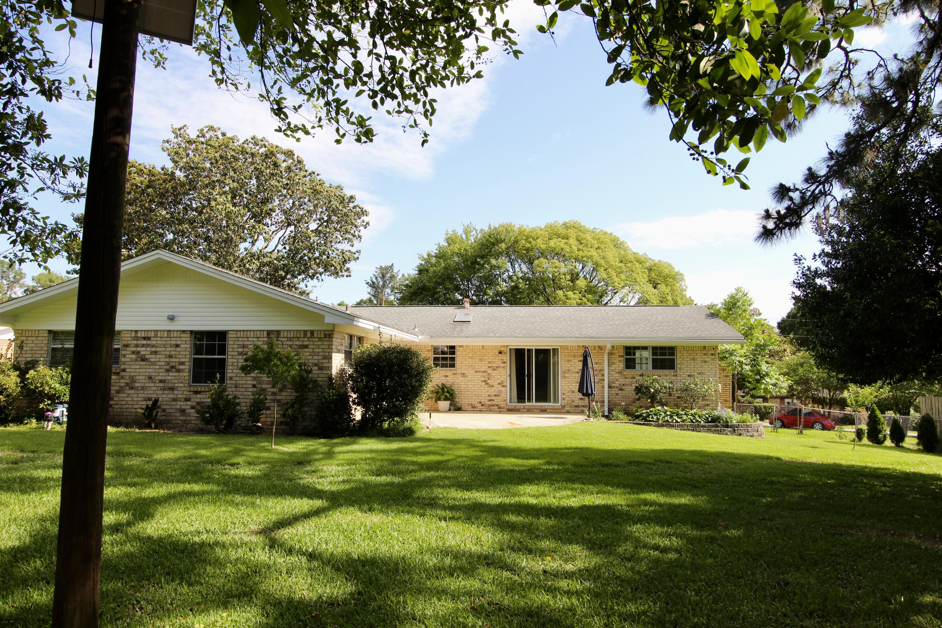 35 Birch Avenue Shalimar, FL 32579 - Photo 29 of 35 a view of house that has a yard