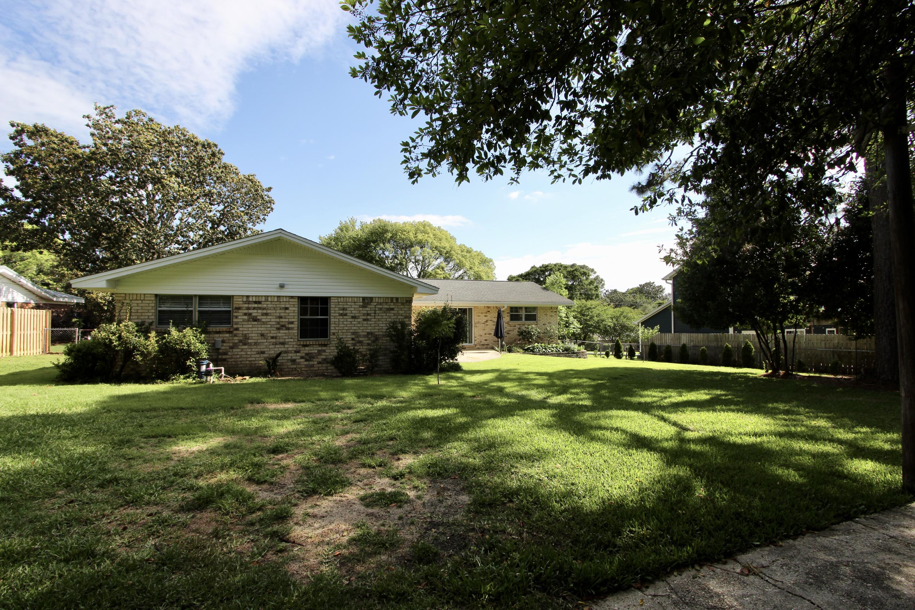 35 Birch Avenue Shalimar, FL 32579 - Photo 30 of 35 a front view of a house with a yard