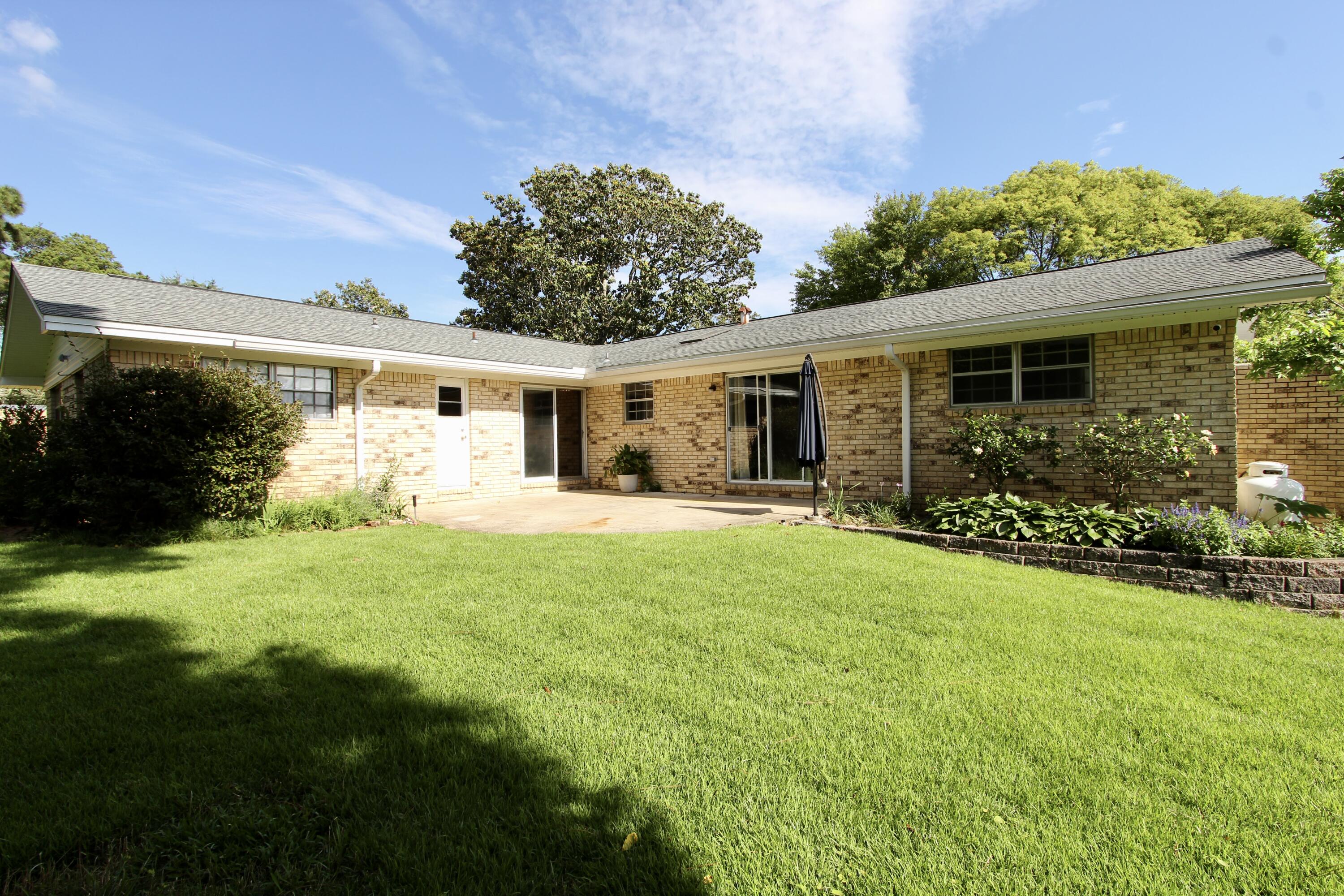35 Birch Avenue Shalimar, FL 32579 - Photo 32 of 35 a front view of house with yard and green space
