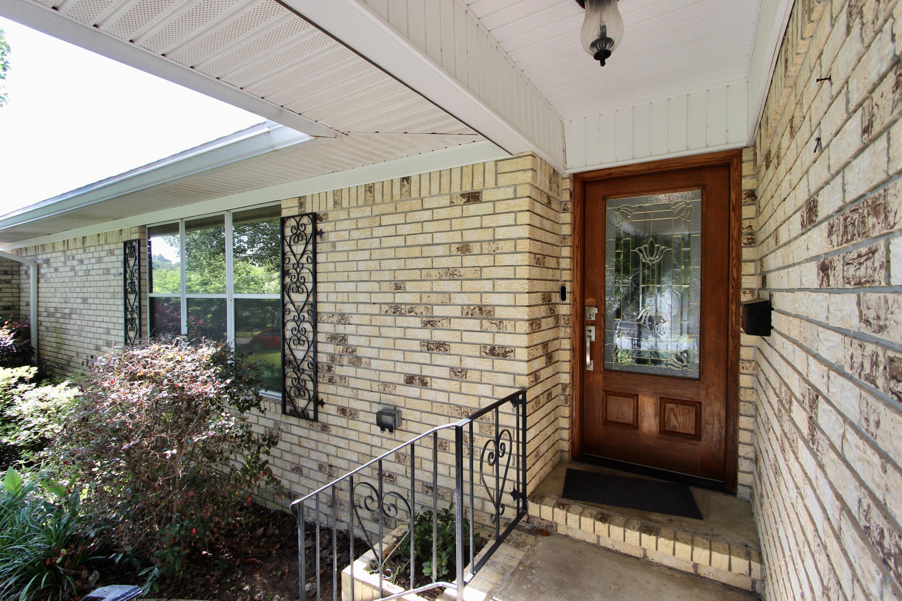 35 Birch Avenue Shalimar, FL 32579 - Photo 6 of 35 a view of a porch