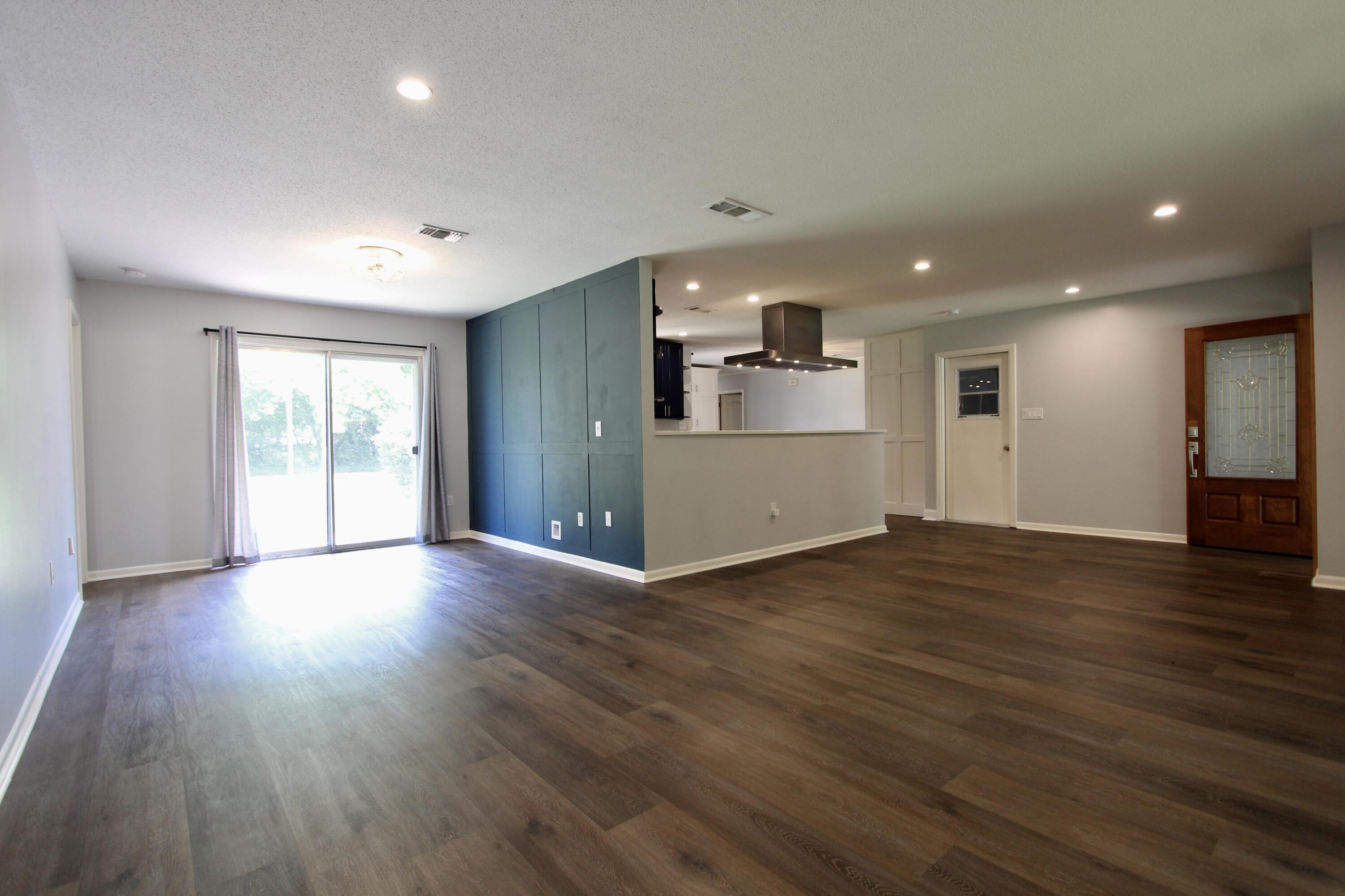 35 Birch Avenue Shalimar, FL 32579 - Photo 10 of 35 a view of empty room with wooden floor and window