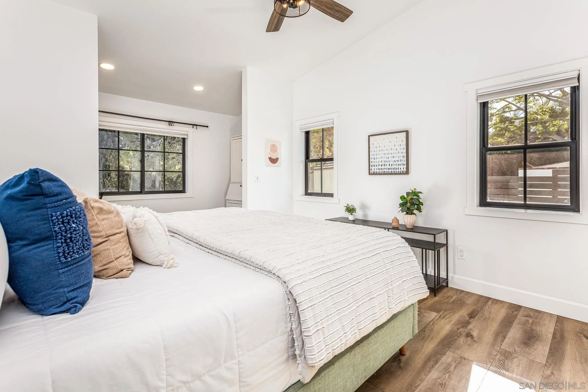 2335 Ivy Road Oceanside, CA 92054 - Photo 46 of 53 a bedroom with a large bed and a window