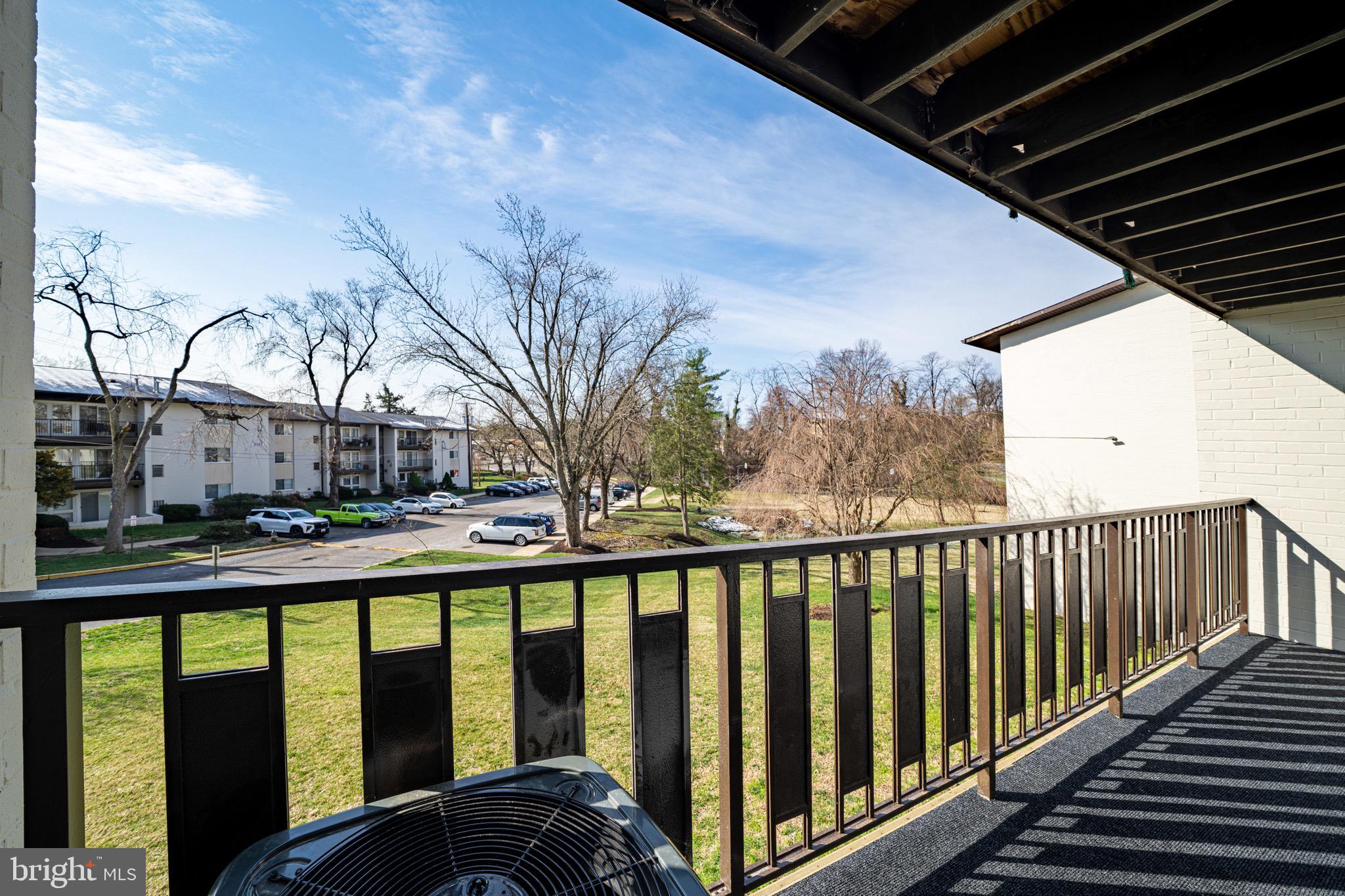 3122 Brinkley Road, Unit 102 Temple Hills, MD 20748 - Photo 11 of 44 a view of a street from a balcony