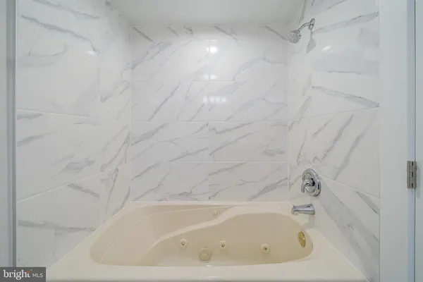 a bathroom with a bathtub