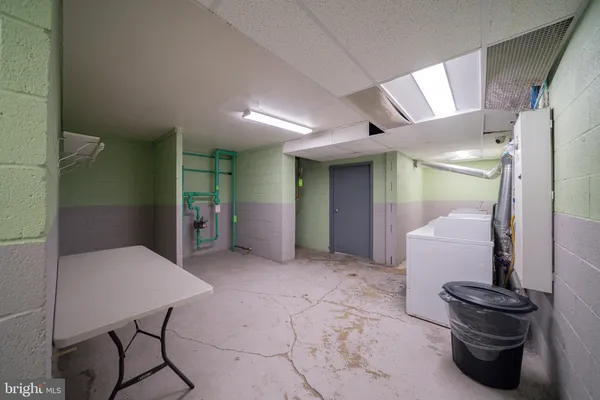 a view of livingroom with furniture and a window