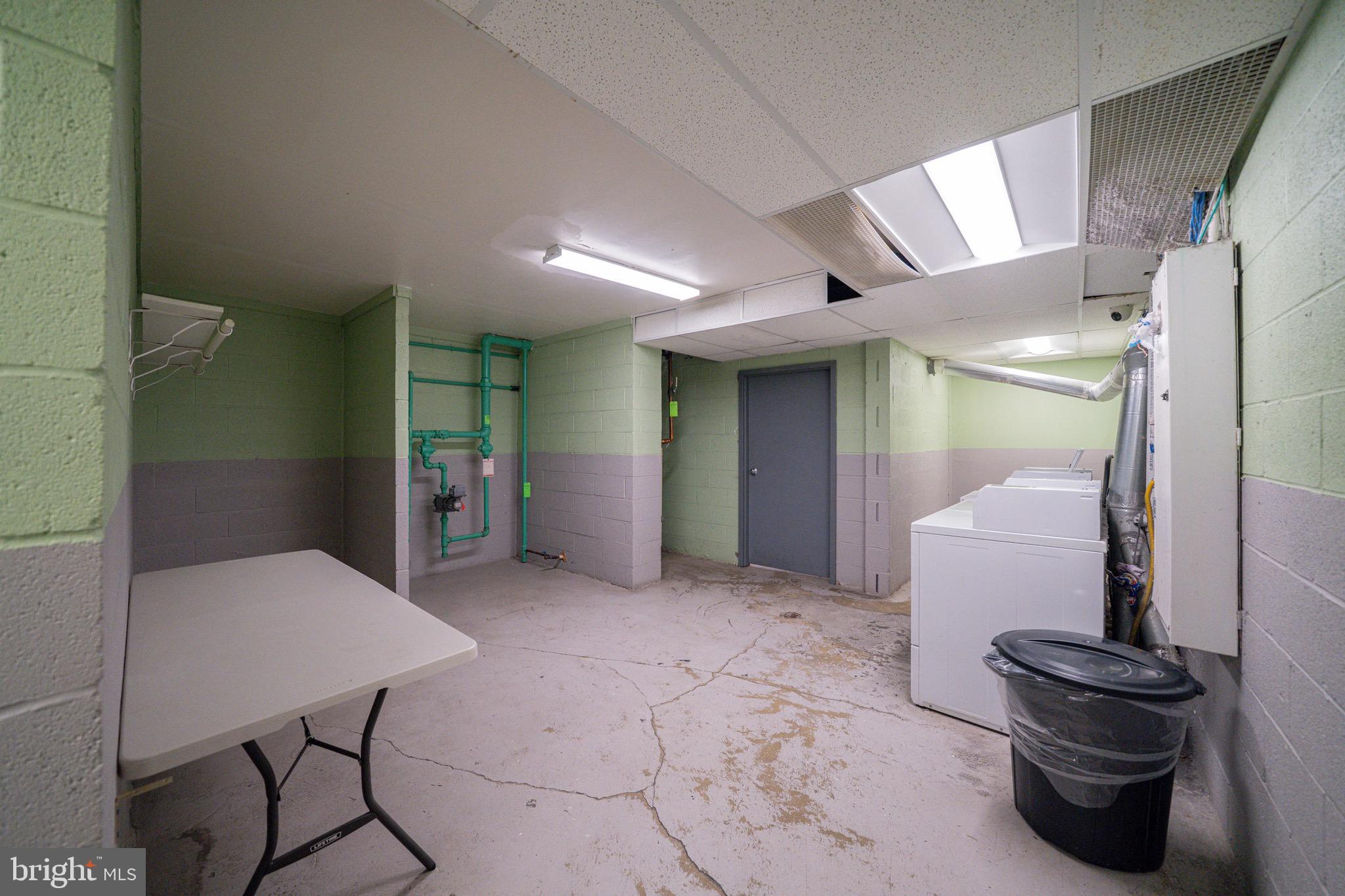 3122 Brinkley Road, Unit 102 Temple Hills, MD 20748 - Photo 33 of 44 a view of livingroom with furniture and a window