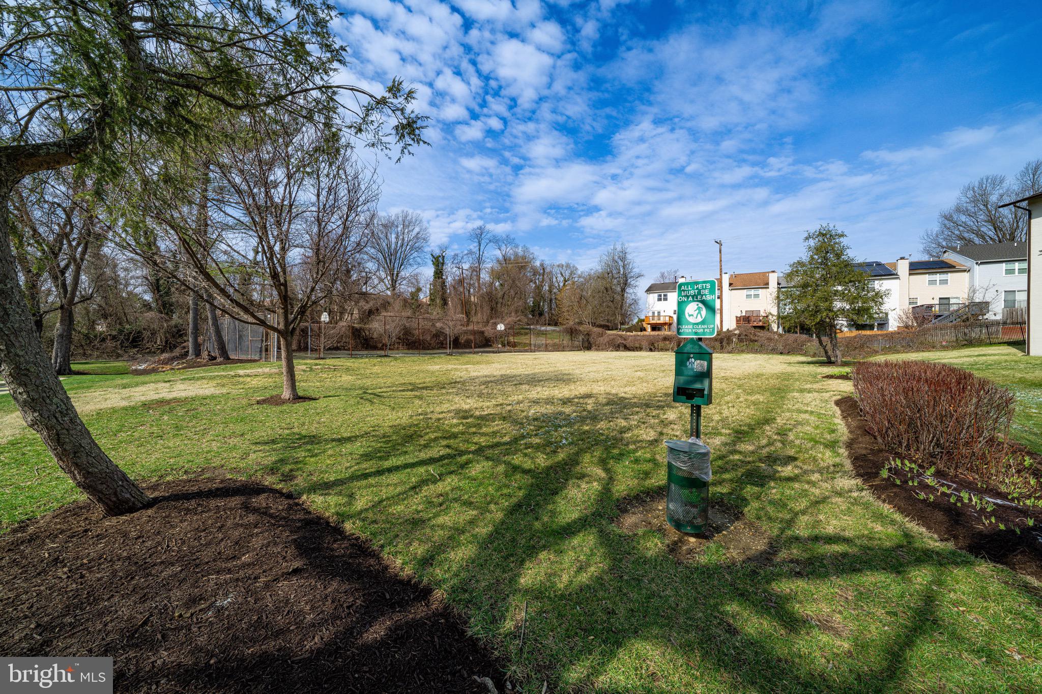 3122 Brinkley Road, Unit 102 Temple Hills, MD 20748 - Photo 37 of 44 a view of a park with large trees