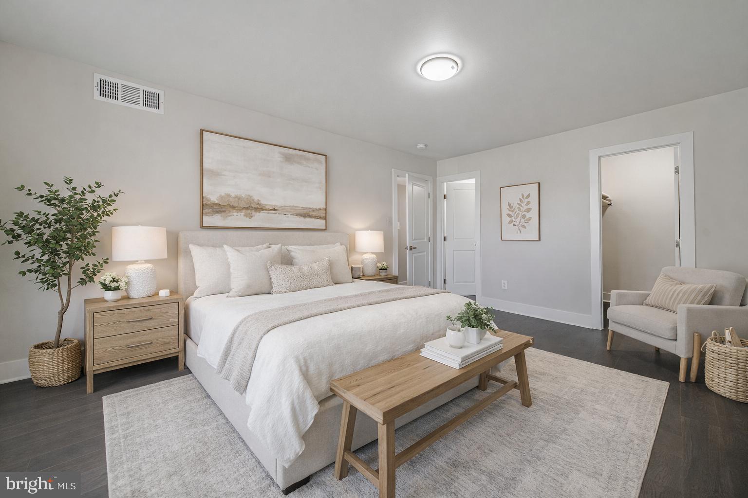 3122 Brinkley Road, Unit 102 Temple Hills, MD 20748 - Photo 43 of 44 a bedroom with a bed and a couch