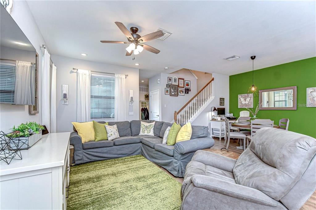 5703 Colony Glen Road Lithia, FL 33547 - Photo 20 of 56 a living room with furniture and wooden floor