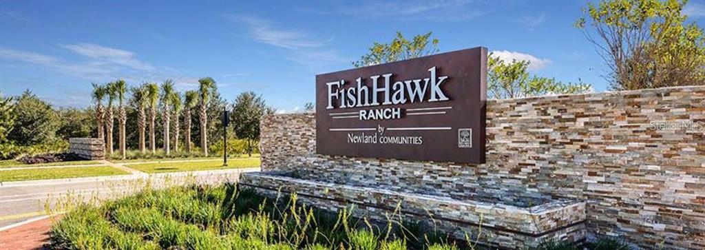 5703 Colony Glen Road Lithia, FL 33547 - Photo 40 of 56 a view of a street sign under a tree