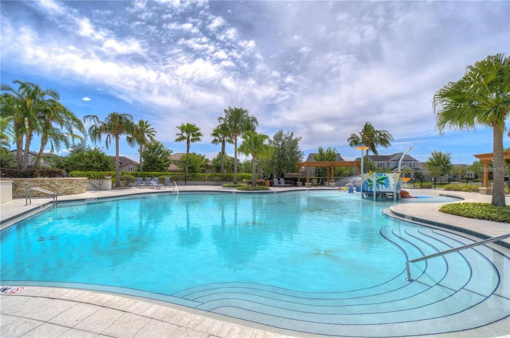 5703 Colony Glen Road Lithia, FL 33547 - Photo 43 of 56 a view of a swimming pool and an outdoor seating