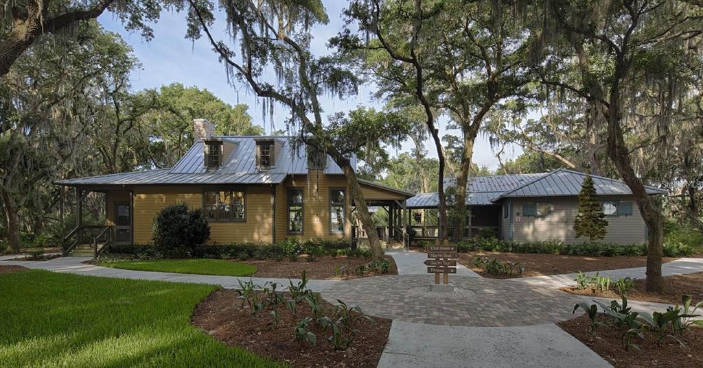 5703 Colony Glen Road Lithia, FL 33547 - Photo 47 of 56 a front view of a house with garden