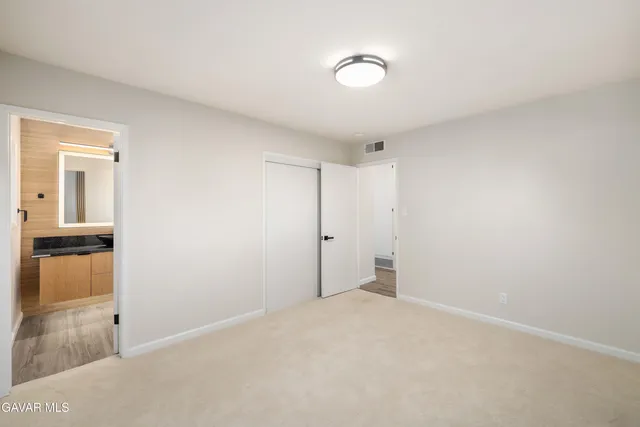 a view of a room with an empty space