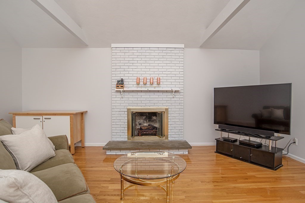 2 Mattakesett Circle Sharon, MA 02067 - Photo 13 of 40 a living room with furniture and a flat screen tv