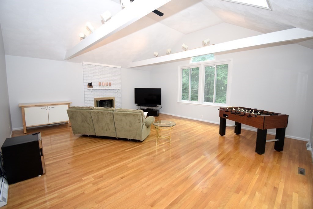 2 Mattakesett Circle Sharon, MA 02067 - Photo 14 of 40 a living room with furniture and a flat screen tv