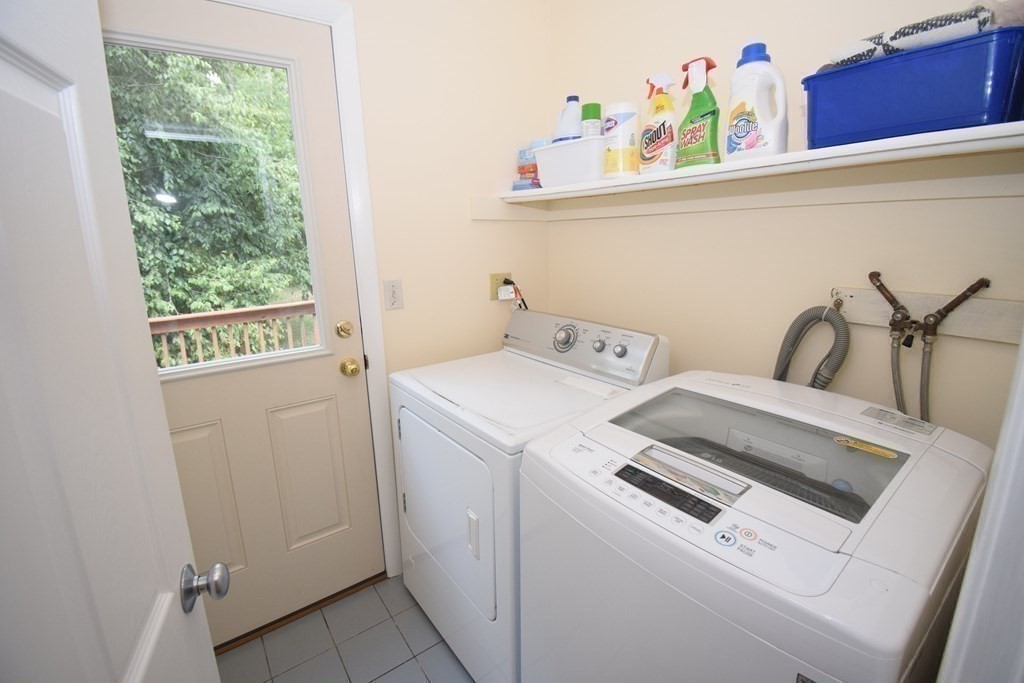 2 Mattakesett Circle Sharon, MA 02067 - Photo 18 of 40 a utility room with dryer and washer