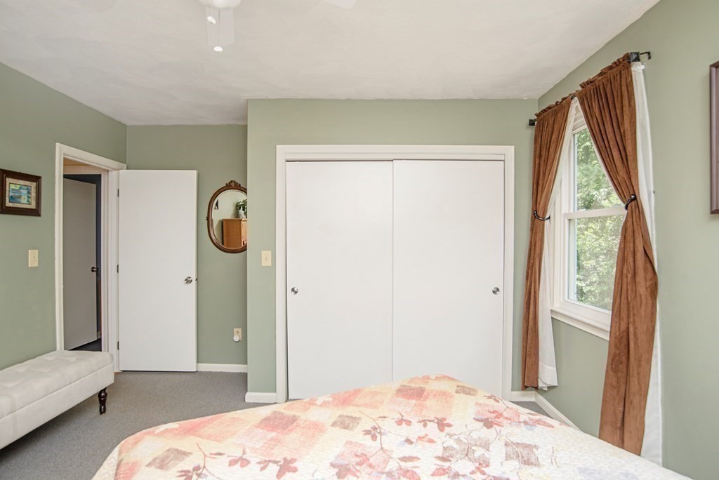 2 Mattakesett Circle Sharon, MA 02067 - Photo 30 of 40 a bedroom with a bed and a window