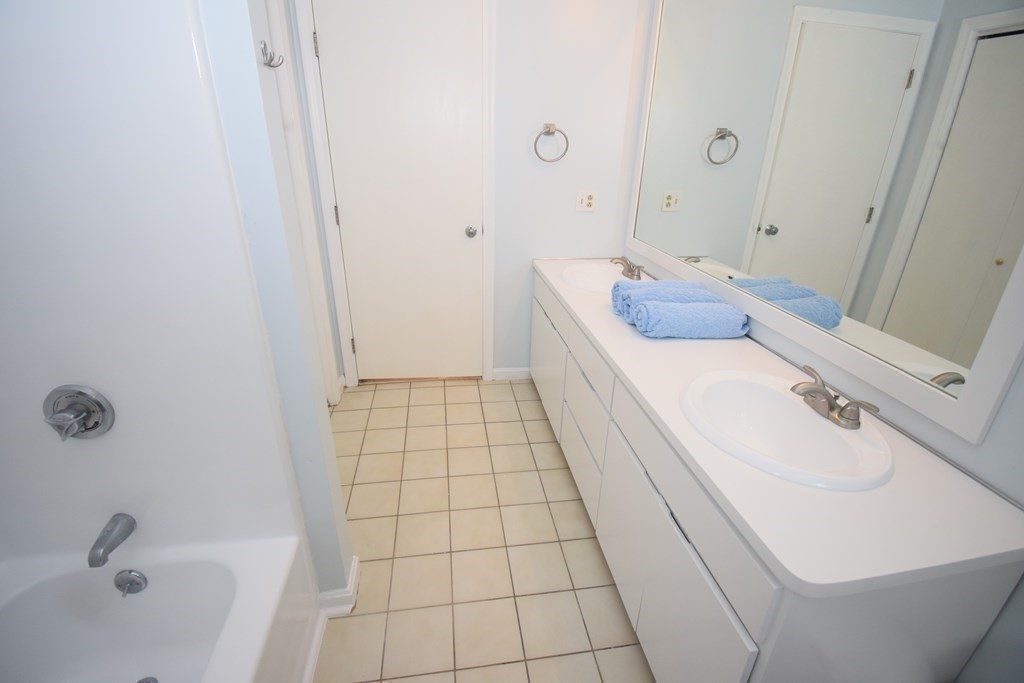 2 Mattakesett Circle Sharon, MA 02067 - Photo 32 of 40 a bathroom with a sink a toilet and shower